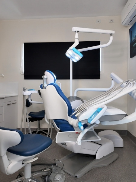 Dentist in Carrara talking with a patient at Carrara Dental on the Gold Coast